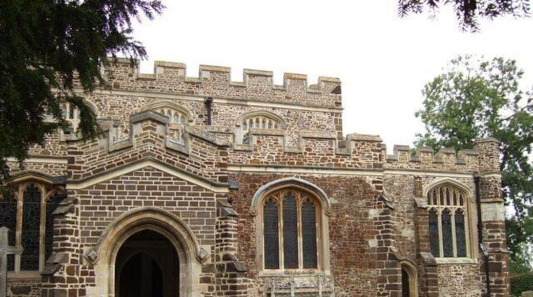 St Nicholas, Tingrith : Porch, South Aisle & Nave. The tower of this church is undergoing maintenance, while the clean contrasting mortar and stones on this part of the building suggest perhaps that this section has already had some work performed on it.