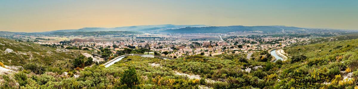 landscape with olive trees and hills in the Provence near village of Coudoux