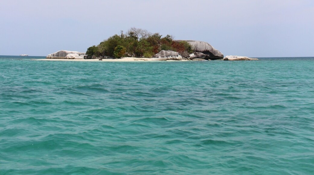 Another breathtaking view at another island off of Belitung. There is a plethora of stunning islands off of Belitung island. Each one is surrounded with captivating and dramatic rocks, clear water that makes you want to jump in and swim all day long, and white sands. Belitung is more than twice of the size of Singapore. Despite of its almost unknown name compared to Bali, the roads around the whole island are smooth and very well taken care of. Which makes going around the island to be very easy. These fascinating smaller islands are found on the west side of Belitung. The closest ones are about ten minutes away from the dockage area. You definitely must do island-hopping once you visit Belitung. It is just as beautiful as island-hopping in Greece or the Mediterranean, but with warm water. As warm as a bath tub. Mother Nature's tub, I suppose.
#WeekendGetaway