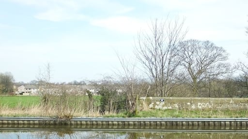 Galgate is south of Lancaster University , Lancaster, Lancashire. In the parish of Ellel, it is on the River Conder, A6 road, the Lancaster Canal, the West Coast Main Line and National Cycle Route 6. It is home to the former Galgate Silk Mill.