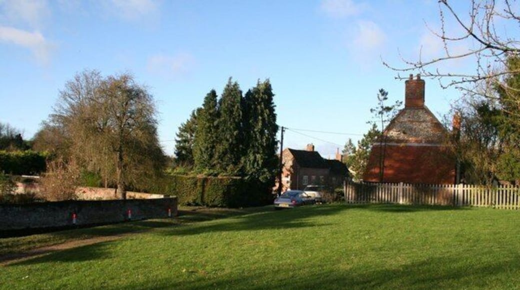 Across the green Looking across the green near the school toward the road through the village