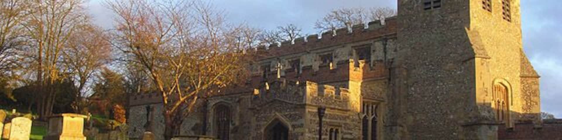 St Mary's, Ewelme The tower dates from the early 14th century. A man may be seen at the top of it. The rest of the church was rebuilt in circa 1432 at the expense of the Earl and Countess of Suffolk. The countess was daughter of the lord of the manor.