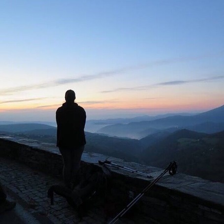 At the top of the mountain at sunrise! #caminodesantiago #whataview #sunrise