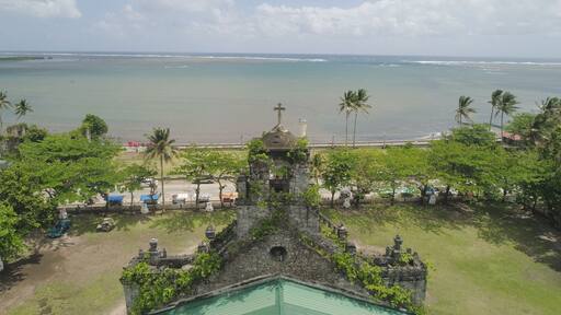 Old, ancient St Joseph church in the city of Barcelona, Sorsogon, Philippines. Church in the Spanish style on the coast near sea.
