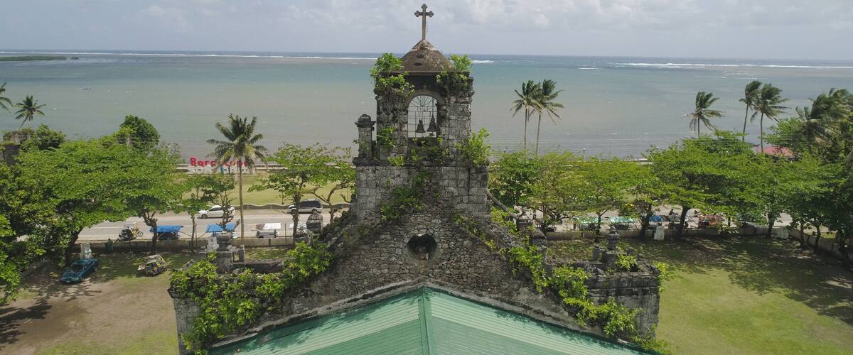 Old, ancient St Joseph church in the city of Barcelona, Sorsogon, Philippines. Church in the Spanish style on the coast near sea.