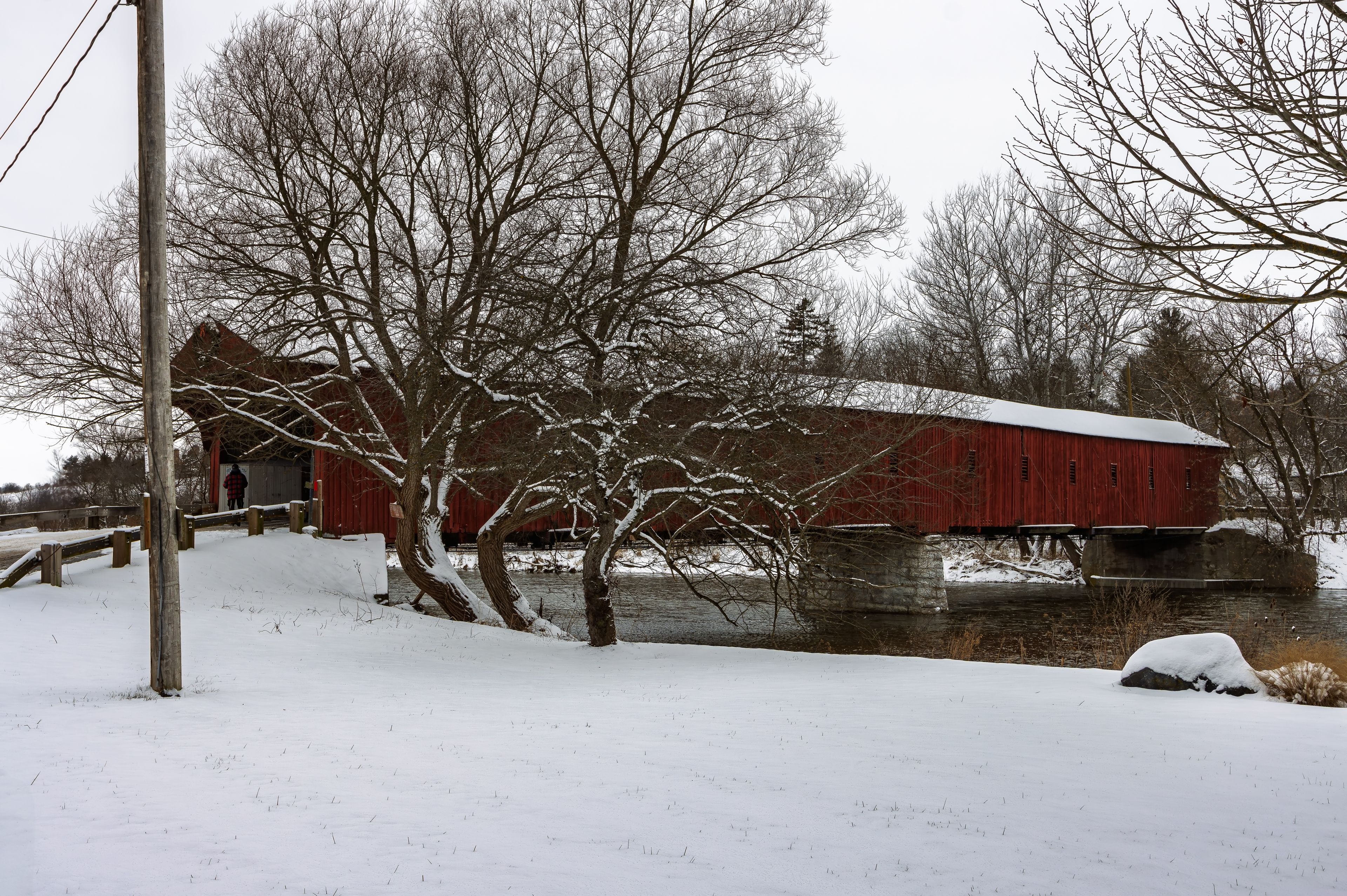 The West Montrose Covered Bridge (also known as the Kissing Bridge) during the winter, near Christmas, Waterloo, ON, Canada.