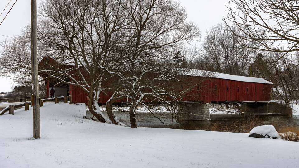 The West Montrose Covered Bridge (also known as the Kissing Bridge) during the winter, near Christmas, Waterloo, ON, Canada.