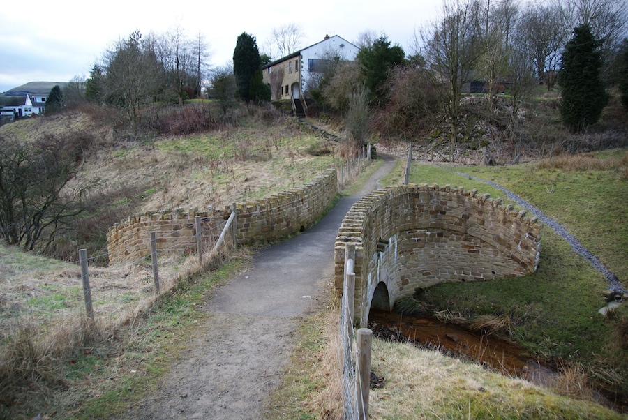 Footbridge over a small brook It appears to be quite a new bridge but it is surprisingly elaborate.