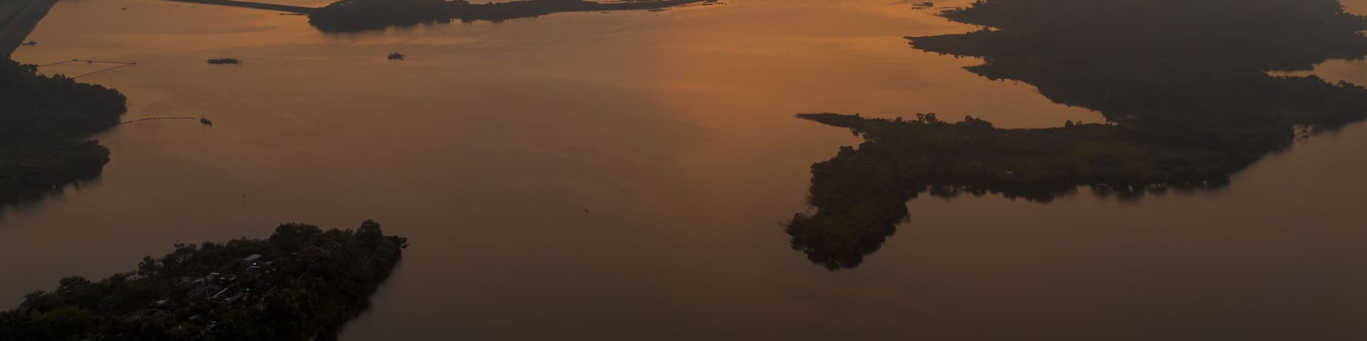 Drone aerial view of morning sunrise with lake view at Wonogiri, Central Java, Indonesia