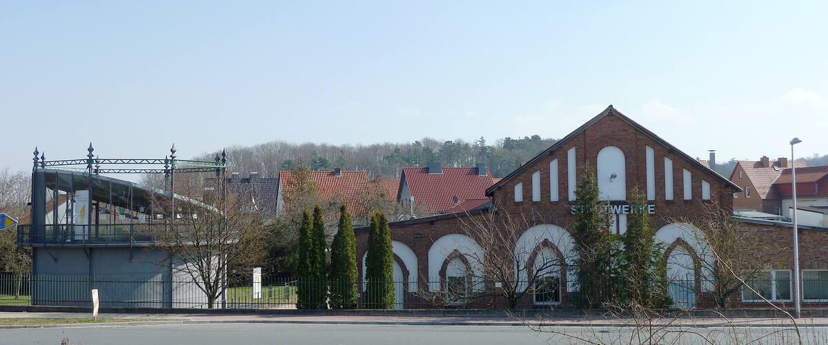 A historic building with arched windows and a brick facade.