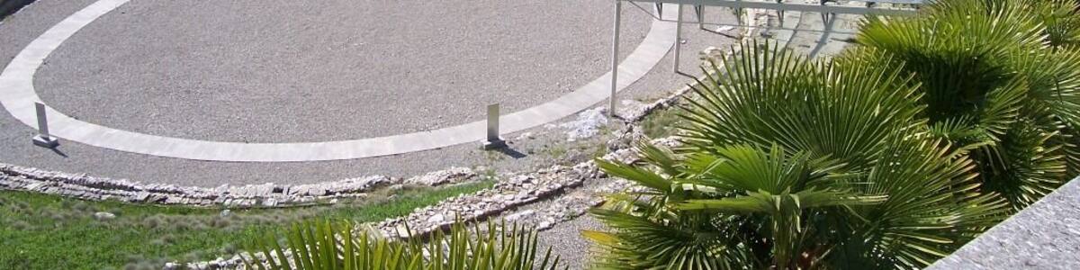 Panorama of the roman amphiteatre. Cividate Camuno, Italy