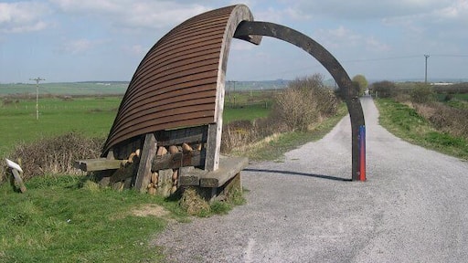 A "clinker built" shelter. On an exposed section of the cycle path around the Taw estuary.