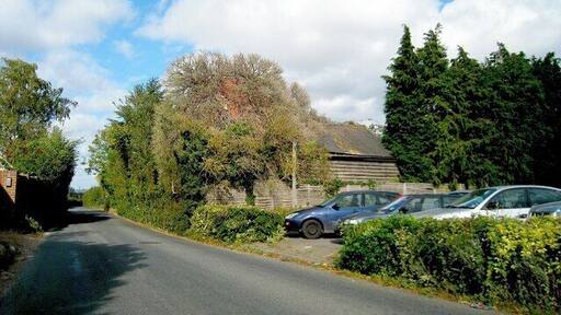 Oast House at Rivendale, Brishing Lane, Boughton Monchelsea, Kent. Single round kiln ragstone oast house. The kiln covered with ivy. Also see with ivy cleared 857809