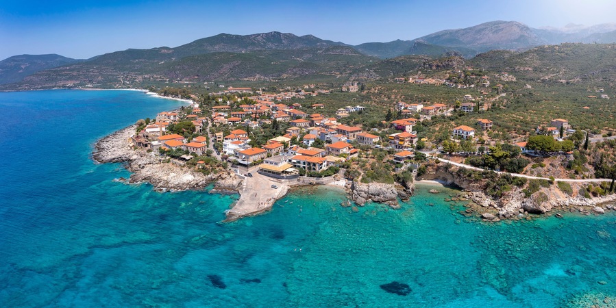 Aerial panoramic view to the idyllic town of Kardamili, Messenia, Peloponnese, Greece