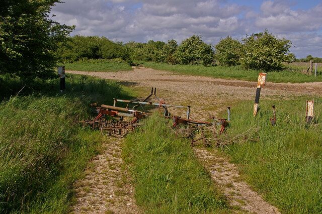 Road block Junction of tracks north of Yarnbury Castle. Although marked on the map as a "byway open to all traffic", someone has clearly decided that it should not be, with the route blocked by this farm implement.