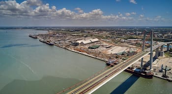 Mozambique, Katembe, Aerial view of container ship sailing under Maputo-Katembe Bridge