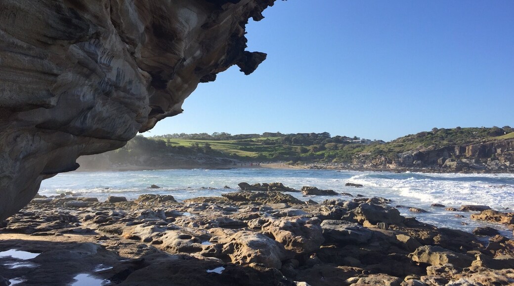 Beautiful beach on the south east coast of Sydney. The sand isn't as fine as some of the other eastern beaches but it was a beautiful spot. We were able to go around on the rocks and experience the waves crashing in. It was pretty rocky and it felt like we were jumping around on moon/crater/lava fields.