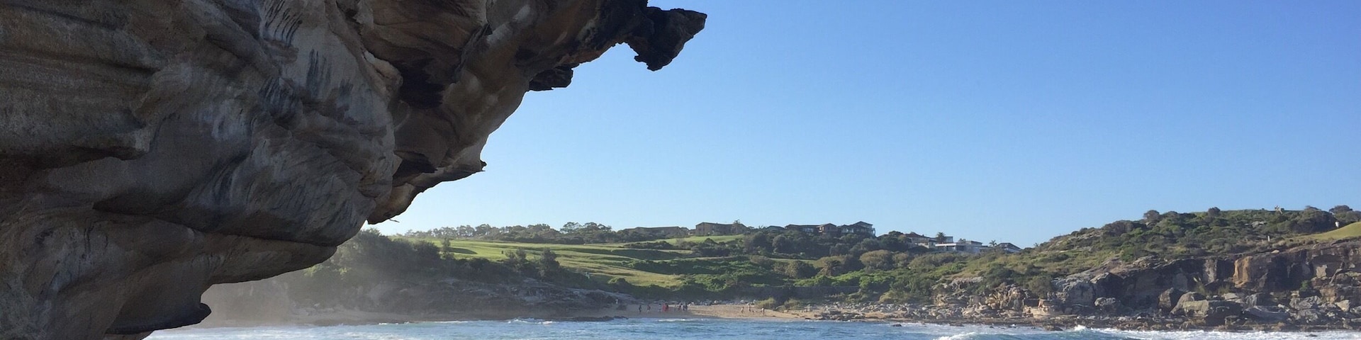Beautiful beach on the south east coast of Sydney. The sand isn't as fine as some of the other eastern beaches but it was a beautiful spot. We were able to go around on the rocks and experience the waves crashing in. It was pretty rocky and it felt like we were jumping around on moon/crater/lava fields.