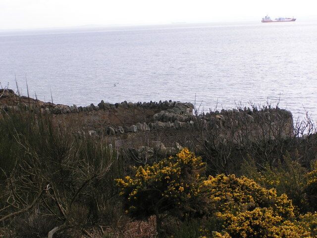 Wiggly Walls The wiggly walls hug the shoreline. The story goes that they were built by the local laird to stop miners walking along the shore to work.