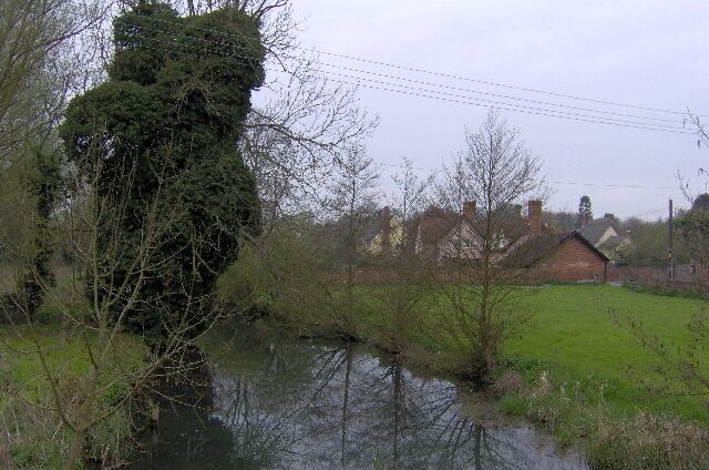 River Brett at Monks Eleigh View from bridge towards village. (Photo submitted 8 May 2006 edited to remove visible date.)