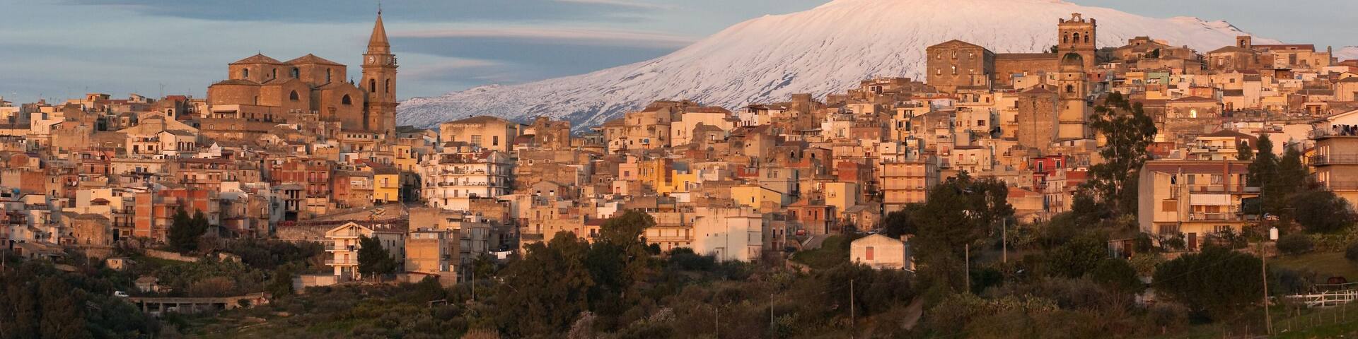 View Of Village On Background Etna