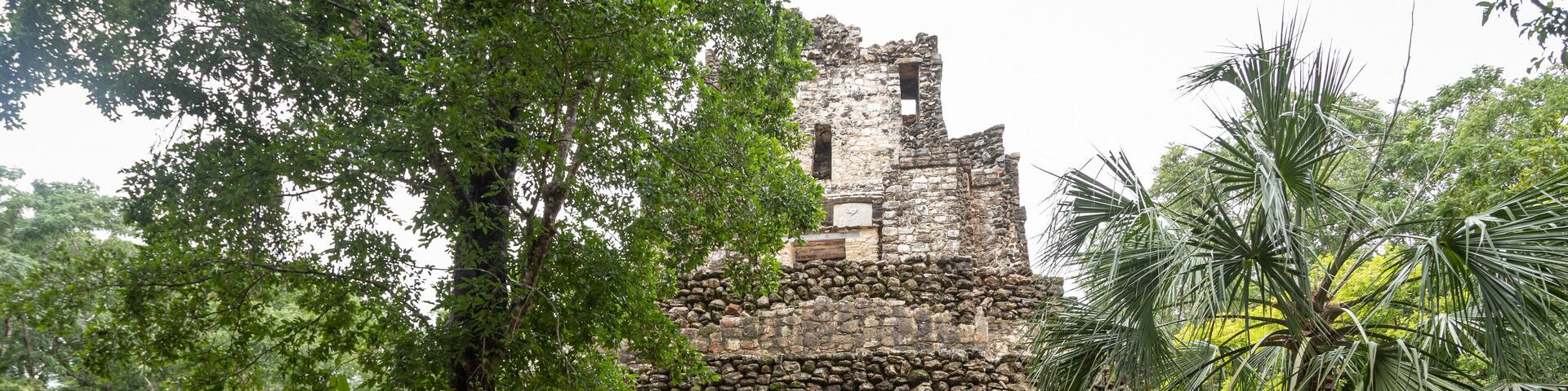 Lost city in the jungle. Mayan Muyil Ruins in Mexico. Ancient Mayan Pyramid at the Muyil site in Quintana Roo