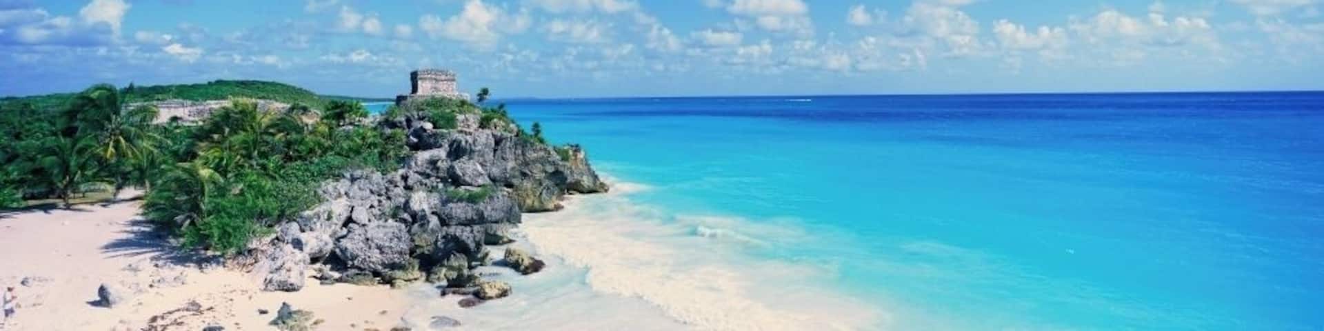 A panoramic view of the Templo del Dios del Viento Mayan ruins of Ruinas de Tulum (Tulum Ruins) in Quintana Roo, Yucatan Peninsula, Mexico