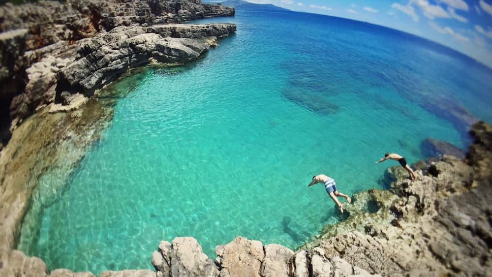 Our first search for a nice swimming spot in Montenegro sure didn't leave us disappointed! At first all we could find was crowded beaches and cliffs full of sea urchins and we felt like giving up, but we decided to head further on a road that just kept getting smaller and smaller until we finally found this amazing place. Our own natural swimming pool, win! \o/ #AquaTrove #montenegro #veslo #cliffs #ocean