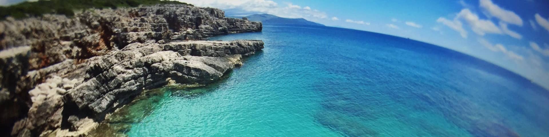 Our first search for a nice swimming spot in Montenegro sure didn't leave us disappointed! At first all we could find was crowded beaches and cliffs full of sea urchins and we felt like giving up, but we decided to head further on a road that just kept getting smaller and smaller until we finally found this amazing place. Our own natural swimming pool, win! \o/ #AquaTrove #montenegro #veslo #cliffs #ocean