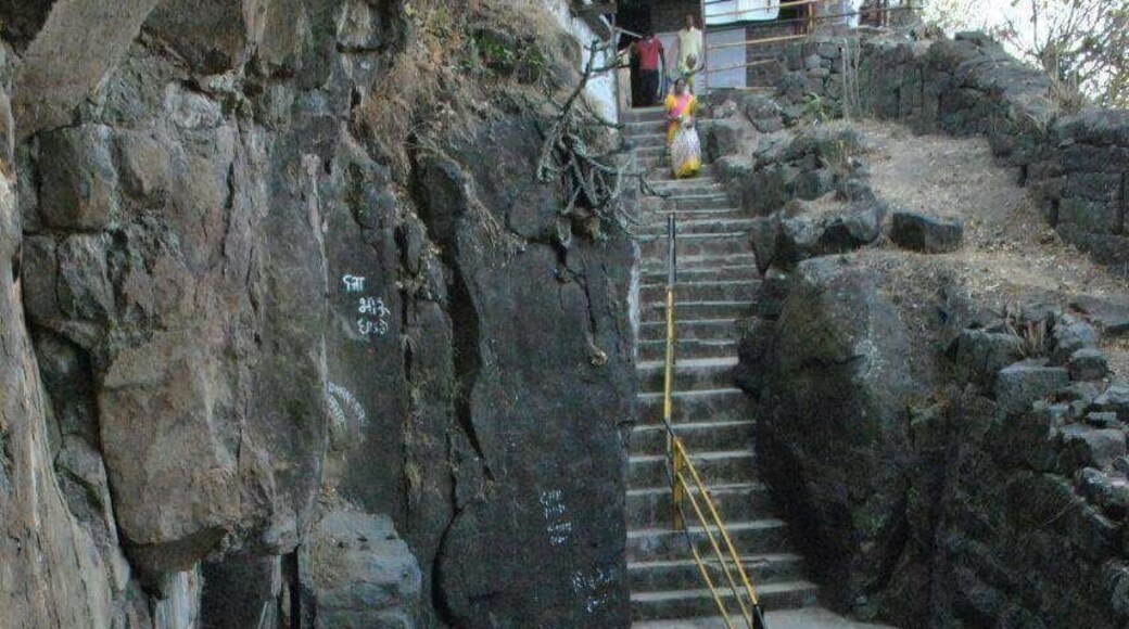 Steps going towards cave. To reach here one has to travel on rough road by vehicle for 3kms & one km walk up on hills.