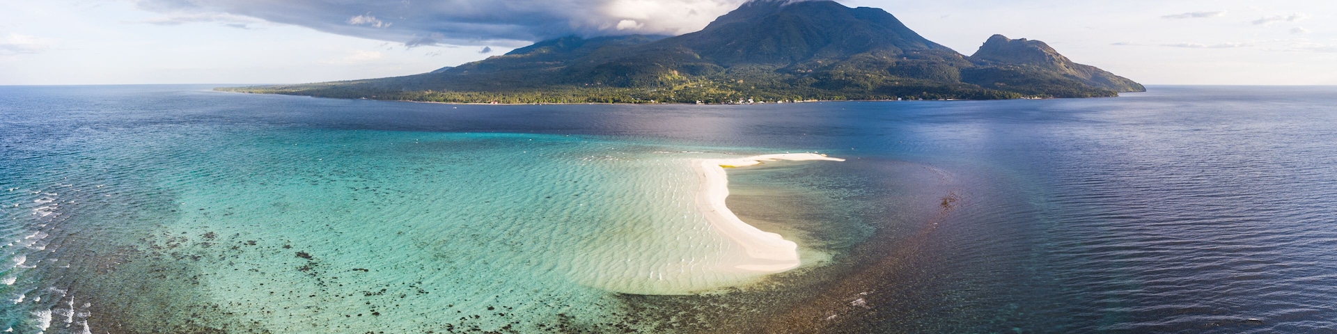 Aerial view of white island sandbar in front of Camiguin Island, Philippines