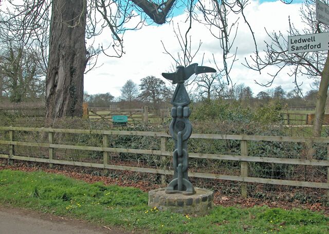 Thank goodness for the finger post Nether Worton village road signs. One wonders if the traditional finger post sign is to supplement the National Cycle Route sign standing next to it which is barely visible and can only be read at close range. Nice bit of road furniture but appears to be a functional as a chocolate fire guard.
