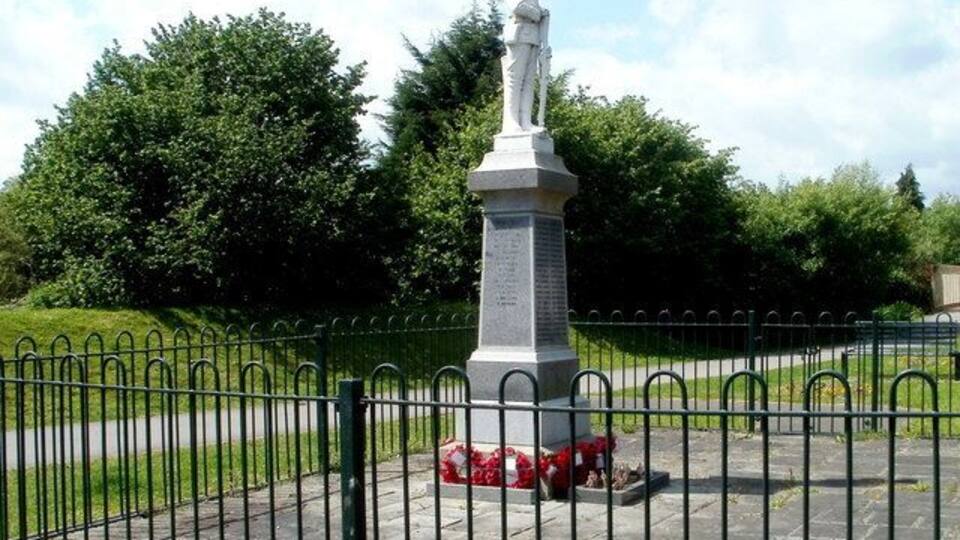 Relocated Trelewis War Memorial. The War Memorial was officially unveiled on Captains Hill on May 31st 1925 as a memorial to the 45 men of Trelewis who died in the Great War. Its original location had by 1999 become isolated, because of mine closures and reshaping of the landscape. It was also suffering some vandalism and beginning to look unkempt and neglected. Thus in 2002, after 3 years of fund-raising by volunteers, a team of Royal Monmouthshire Engineers moved the statue to its new location here, set above the west side of the B4255 near the Ffaldcaiach Inn. Link The rededication of the War Memorial was on June 23rd 2002, after a march of war veterans through the village.