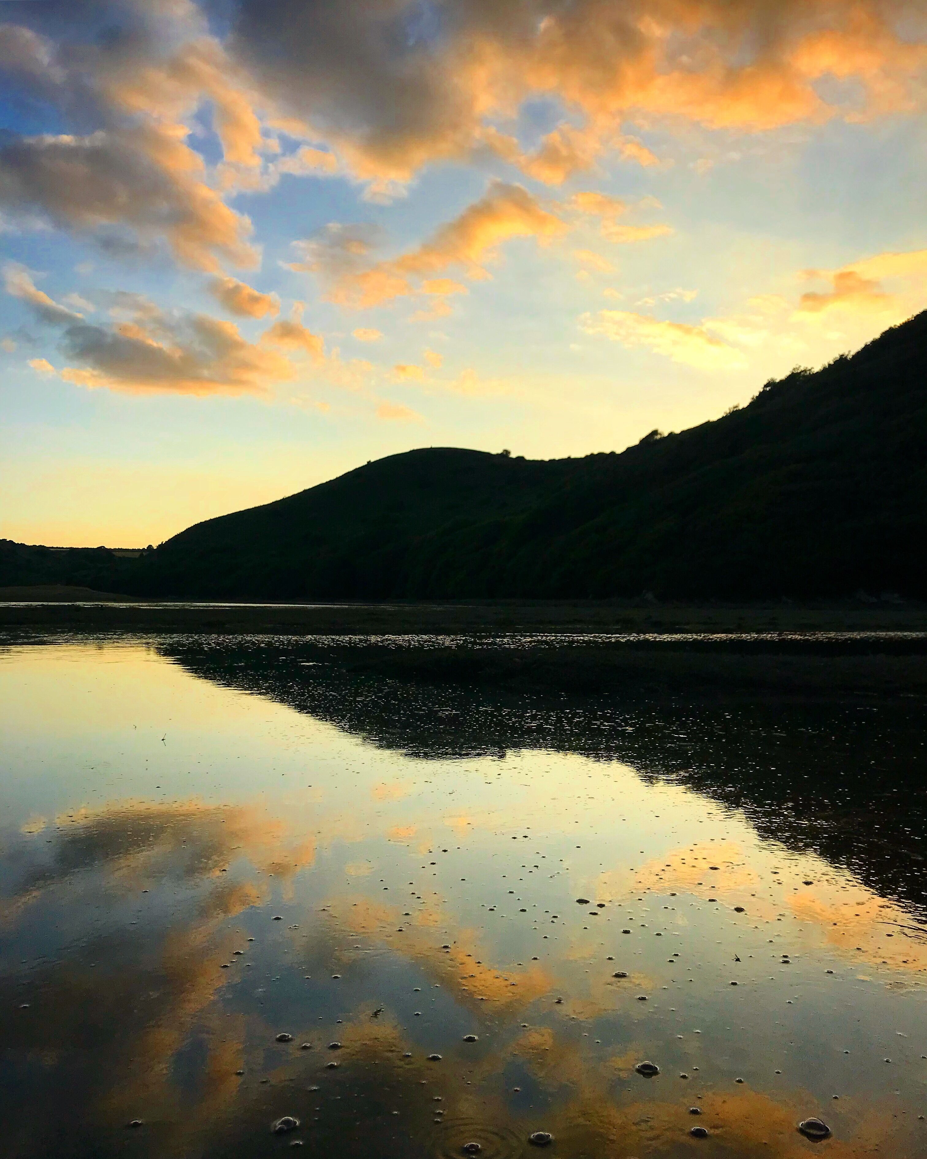 Sunset reflection near Three Cliffs Bay