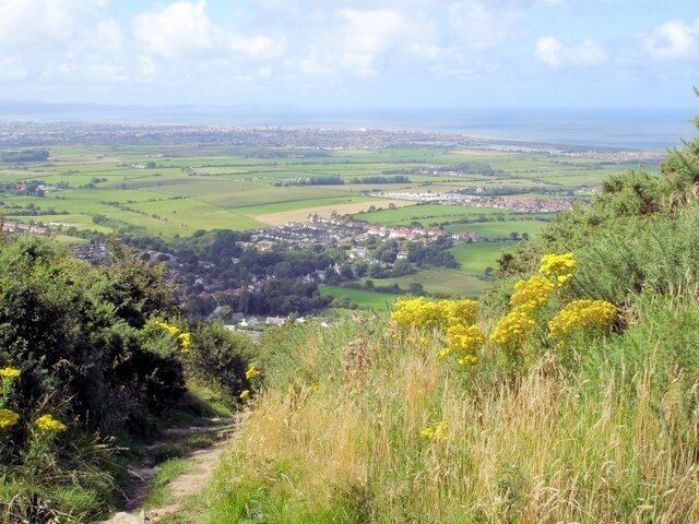 Above Prestatyn on the Offa's Dyke Path Prestatyn, on the Offa's Dyke Path above Coed yr Esgob. Looking west across Llandudno Bay with the Great Orme just visible in the haze in the distance.