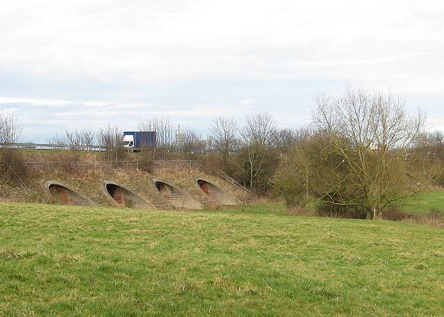 Tunnels under the bypass The truck is travelling along the A40 towards Wales. The tunnels allow floodwater to pass under the bridge. One of them provides a channel for Wells brook to join the River Wye.