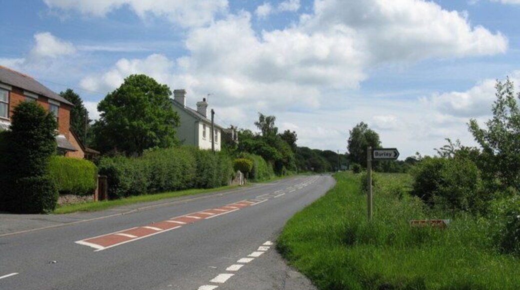 Out of Bromyard The A44 rises toward Bromyard Downs from the old railway bridge at Linton.