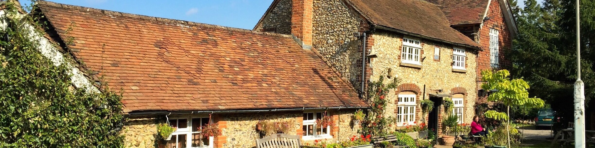 One of the oddest pubs I've ever been to. Live animals inside and a bar cluttered with household items and belongings. Independently owned so no on tap beer and you may worry about the cleanliness! At the mid-point of several local footpaths it's a welcome stop and I definitely recommend a visit.