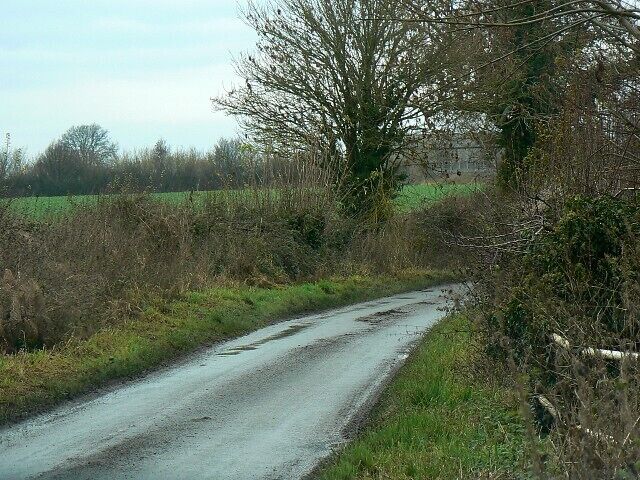 Wood Street, Clyffe Pypard The street is really a country lane. It's been raining.