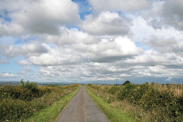 Yarnscombe: on Easton Moor Looking east-north-east in the direction of Easton Moor Cross. The sky has begun to cloud up