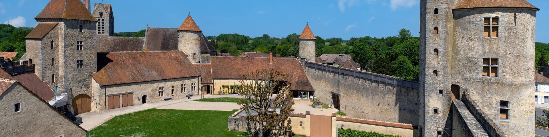 Castle of Blandy les Tours in the Seine-et-Marne department near Paris, France. Panoramic view over the courtyard.