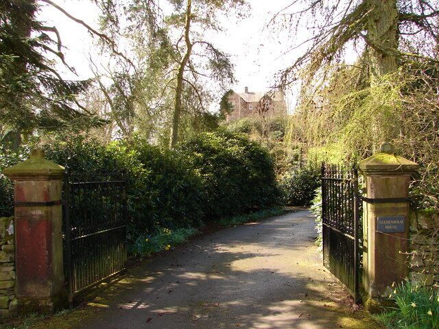Gledenholm House, Ae Gledenholm House, viewed in the glare of a low sun, is perched above encompassing gardens near Ae.