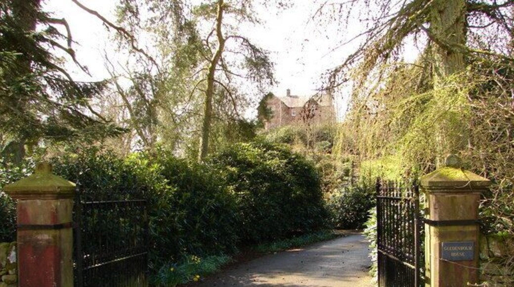 Gledenholm House, Ae Gledenholm House, viewed in the glare of a low sun, is perched above encompassing gardens near Ae.