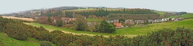 Garvald panorama from Law Knowes This is a linear village in a hidden valley below the Lammermuirs. Several of the buildings are listed and the village and its environs have been designated as a conservation area.