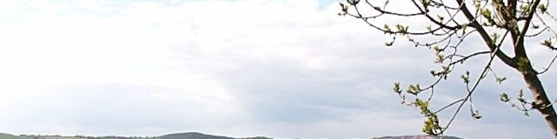 Across the Eden. Looking out across the square from near Nydie Mains to Clyton Caravan Park on the other bank of the Eden.