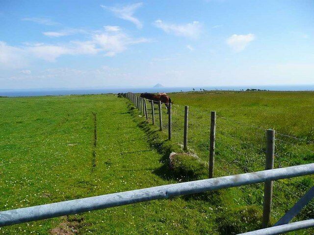 Fields above Bennan Head The volcanic cone of Ailsa Craig ("Paddy's Milestone") visible in the distance 22Km away.