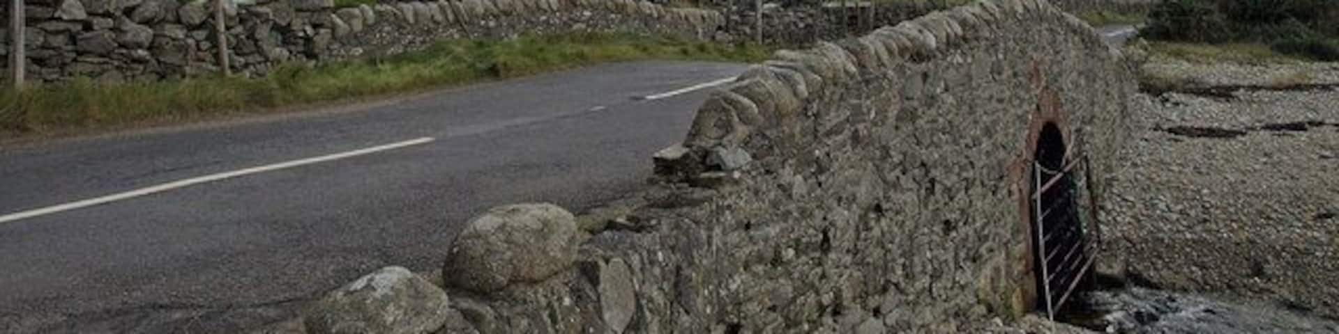 Road Bridge, Catacol Beinn Bhreac above the houses at Fairhaven (on the right of frame). Looking towards Glen Catacol.