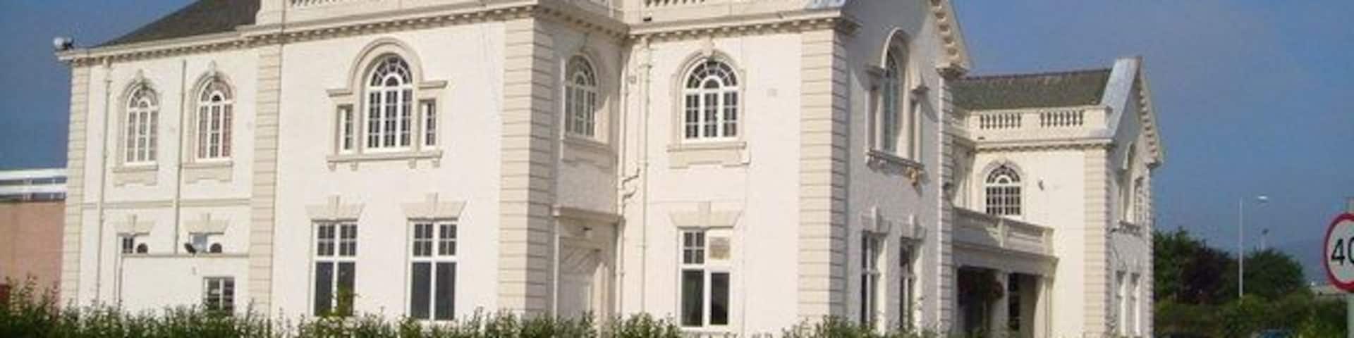 Llay Miners Welfare Institute. This magnificent building was, on completion in 1931, the largest institute in the country built with mining funds. It now offers facilities for conferences, meetings and sports.