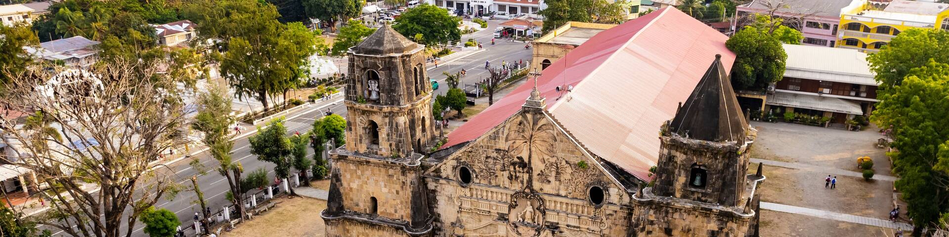 Aerial of Miagao Church and the surrounding town proper. Also known as the Santo Tomás de Villanueva Parish Church