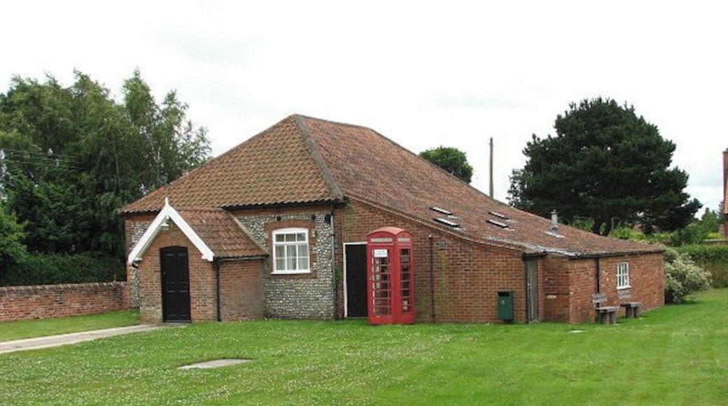 Village hall and red telephone box. The village hall is situated on the green beside the B1149 (Norwich Road) > 877231.